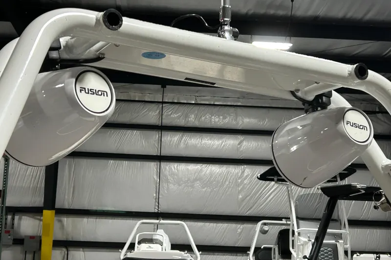 Slide: The Image of Highfield Velox 420 (2025) featuring Fusion marine speakers in a boat interior setting. - 22