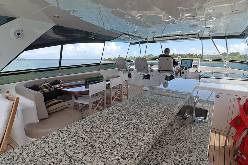 Slide: The Image of Luxurious 2013 Cheoy Lee Bravo yacht interior with granite countertop and ocean view. - 20