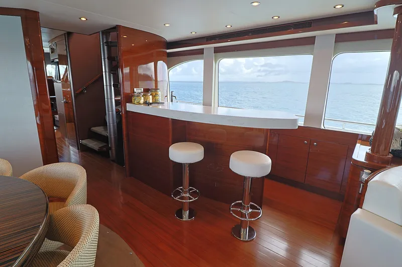 Slide: The Image of Luxurious interior of 2013 Cheoy Lee Bravo yacht with bar and ocean view. - 30