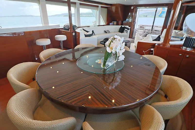 Slide: The Image of Luxurious interior of 2013 Cheoy Lee Bravo yacht with elegant dining area and ocean view. - 35