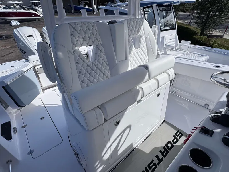 Slide: The Image of 2025 Sportsman 322 Open boat interior with luxurious seating and modern design. - 20