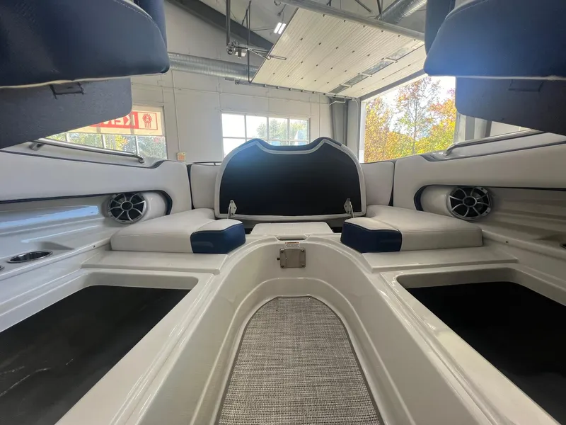 Slide: The Image of Interior view of 2025 Crownline Eclipse E260 XS boat, featuring spacious seating and modern design. - 14