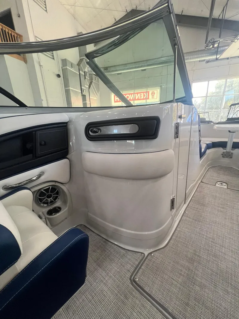 Slide: The Image of 2025 Crownline Eclipse E260 XS interior with modern design and seating. - 24