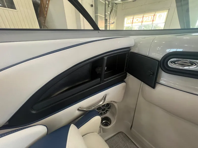 Slide: The Image of Interior view of 2025 Crownline Eclipse E260 XS boat, featuring sleek design and modern finishes. - 26