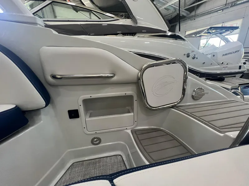Slide: The Image of 2025 Crownline Eclipse E260 XS boat interior, featuring sleek design and modern amenities. - 33