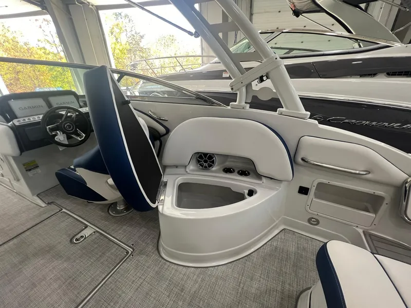 Slide: The Image of Interior of 2025 Crownline Eclipse E260 XS boat, featuring sleek seating and modern design. - 34