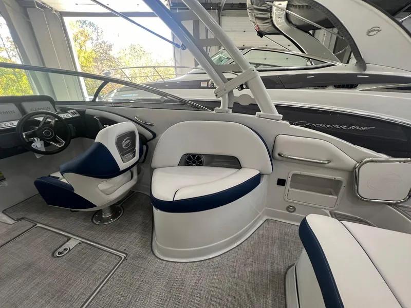 Slide: The Image of 2025 Crownline Eclipse E260 XS boat interior with modern seating and sleek design. - 35