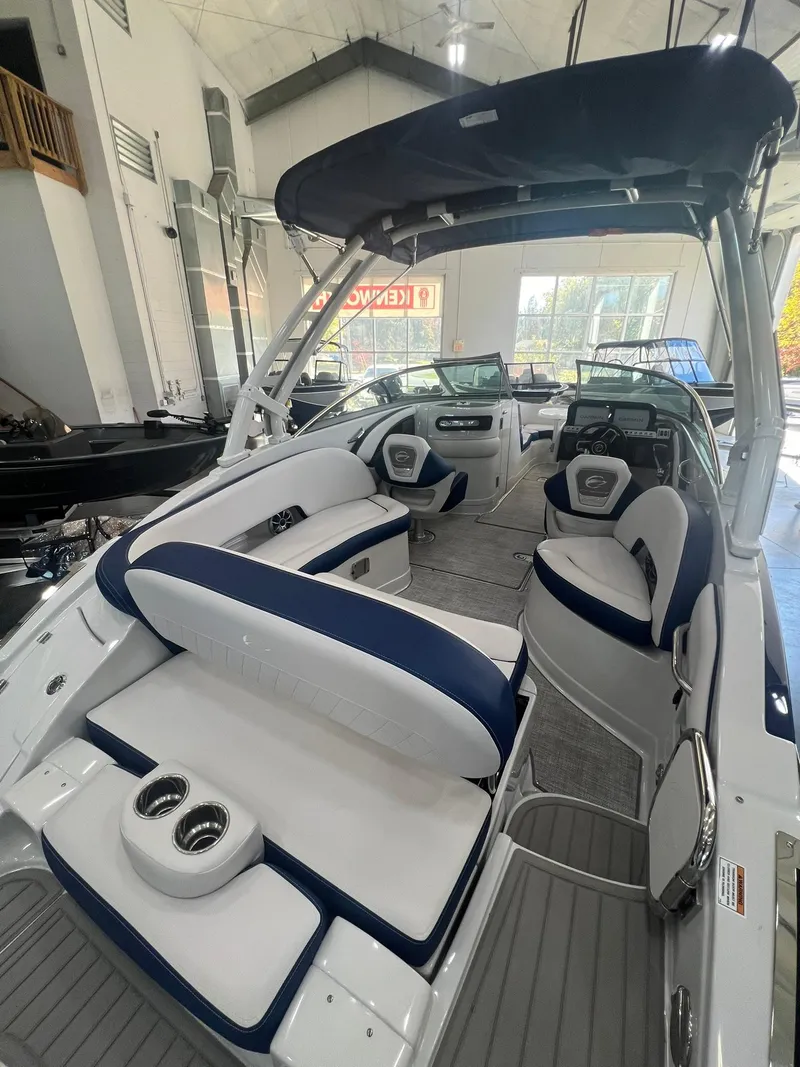 Slide: The Image of 2025 Crownline Eclipse E260 XS boat interior with modern seating and sleek design. - 42
