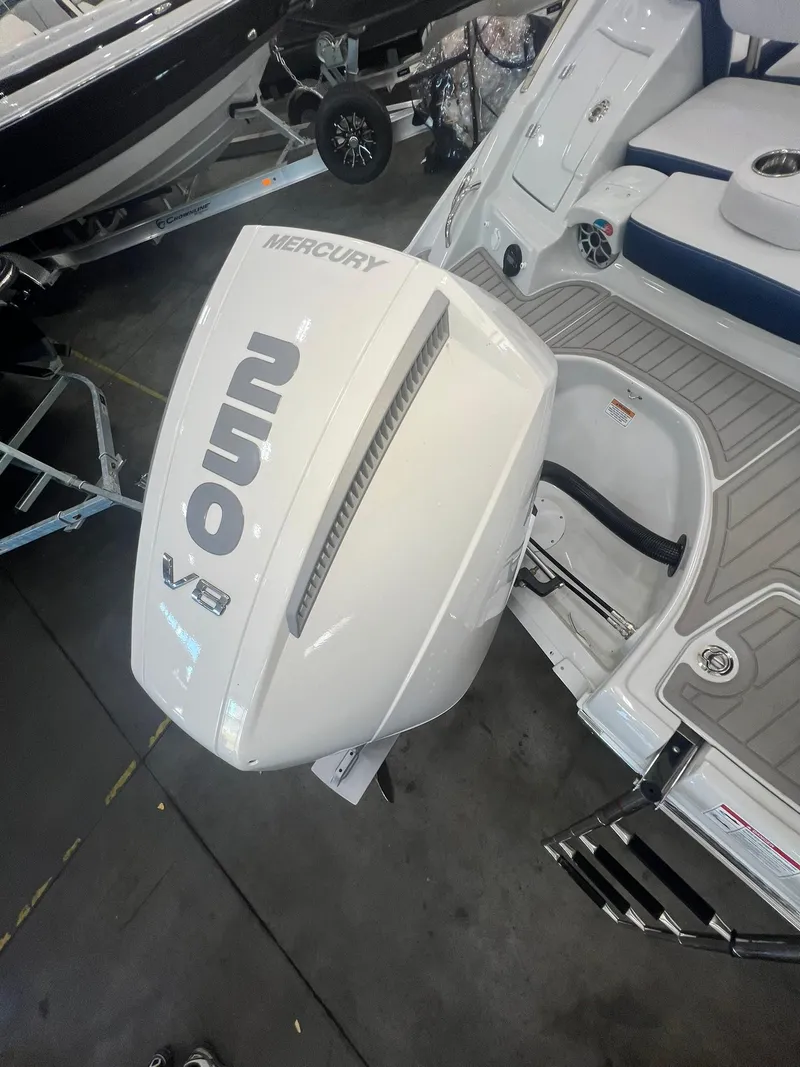 Slide: The Image of 2025 Crownline Eclipse E260 XS with Mercury 250 V8 outboard engine. - 6
