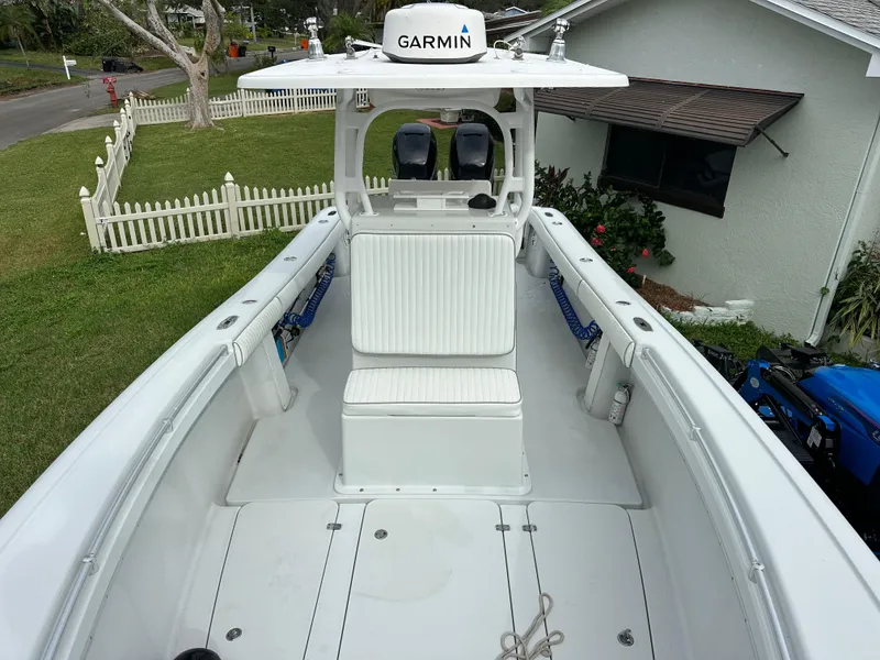 Slide: The Image of 2001 Yellowfin 31 boat with Garmin equipment, white interior, and outdoor setting. - 20