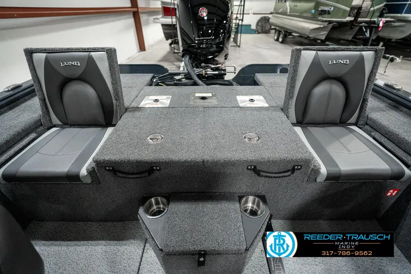 Slide: The Image of 2025 Lund 1875 Pro-V Bass XS boat interior with seating and storage compartments. - 22