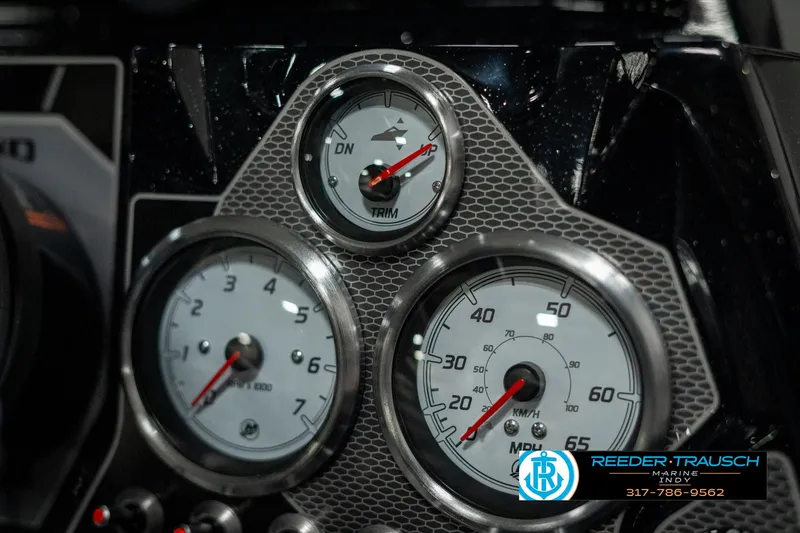 Slide: The Image of Dashboard gauges of 2025 Lund 1875 Pro-V Bass XS boat. - 31