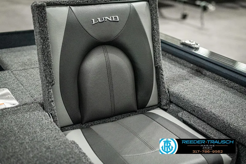 Slide: The Image of 2025 Lund 1875 Pro-V Bass XS boat seat, gray and black upholstery, Reeder-Trausch logo. - 34