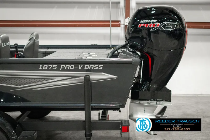 Slide: The Image of 2025 Lund 1875 Pro-V Bass XS boat with Mercury Pro XS engine in showroom. - 39