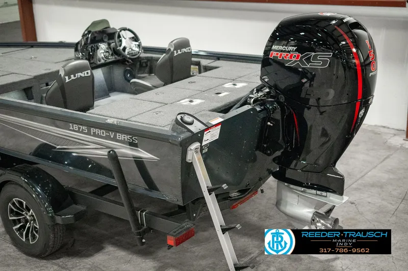 Slide: The Image of 2025 Lund 1875 Pro-V Bass XS boat with Mercury Pro XS engine in showroom. - 44