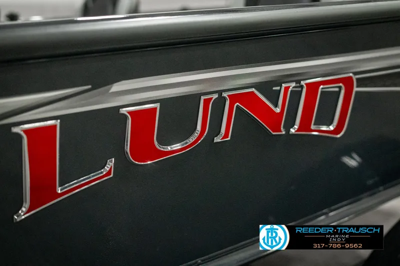 Slide: The Image of 2025 Lund 1875 Pro-V Bass XS boat logo in bold red lettering. - 46
