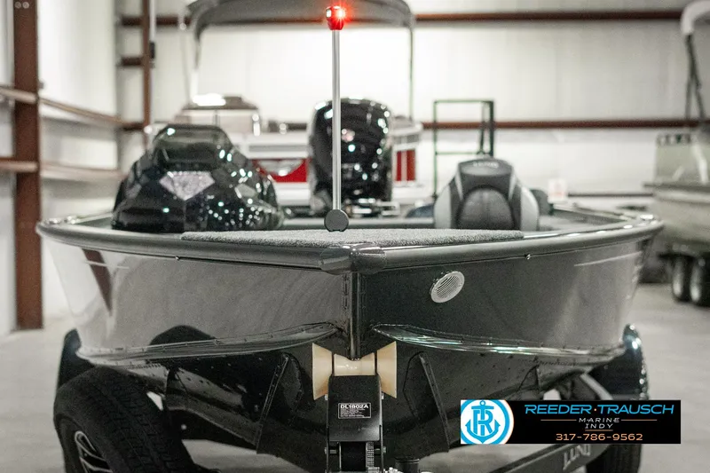 Slide: The Image of 2025 Lund 1875 Pro-V Bass XS boat in showroom, front view. - 5