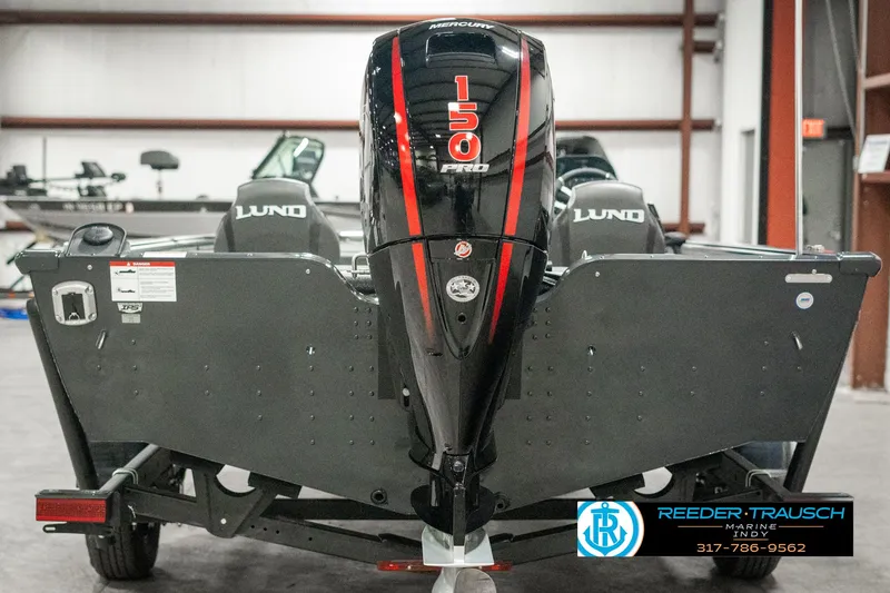 Slide: The Image of 2025 Lund 1875 Pro-V Bass XS boat with 150 HP engine in showroom. - 6
