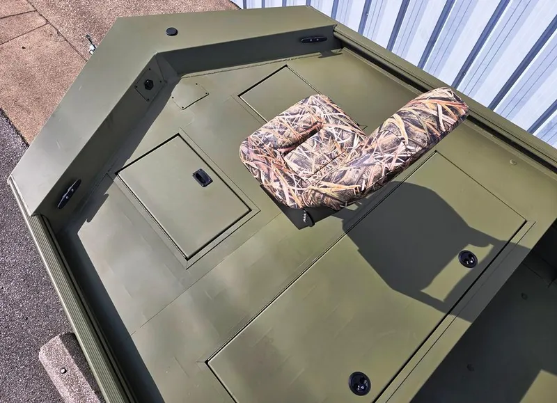 Slide: The Image of Deluxe bow modification with under deck aerated livewell & storage compartments. - 4