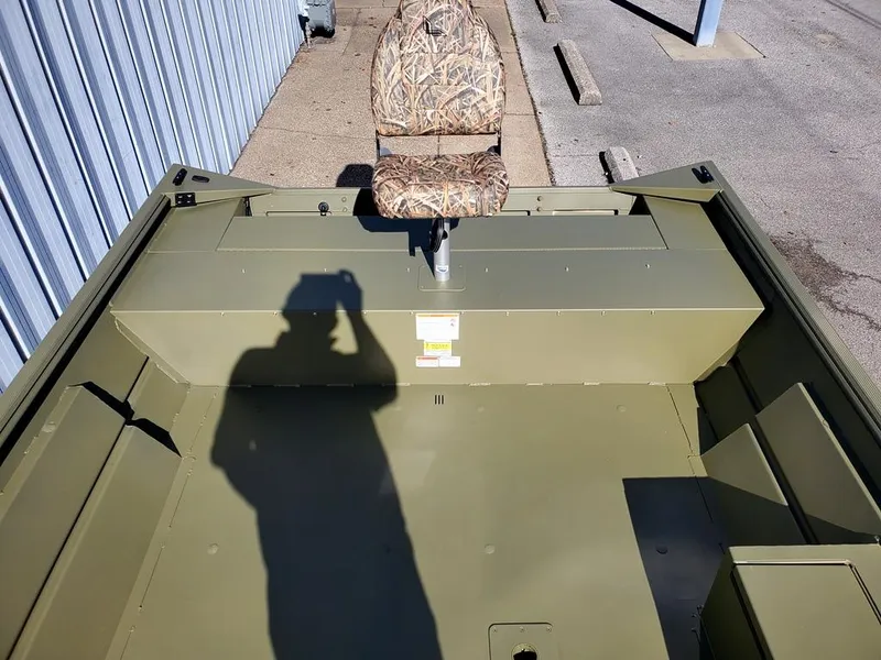 Slide: The Image of 2025 Lowe Roughneck RX2070 Tiller Steer boat interior with camo seat. - 8