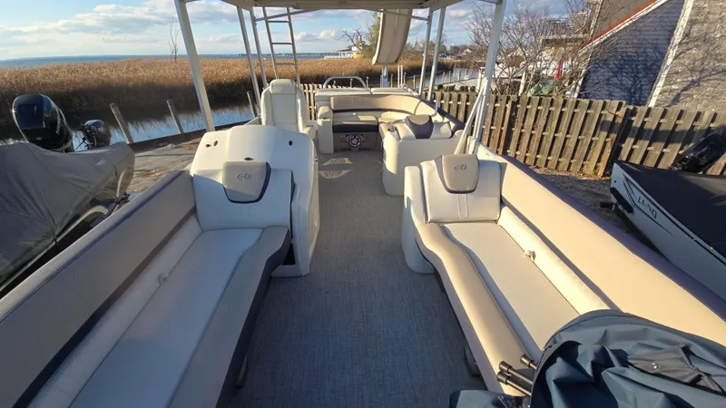 Slide: The Image of 2023 Avalon Catalina Cruise Funship boat with spacious seating and canopy. - 12