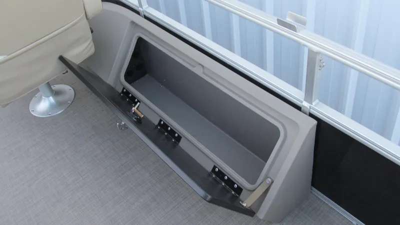 Slide: The Image of 2023 Sun Tracker SportFish 22 XP3 storage compartment open on deck. - 16