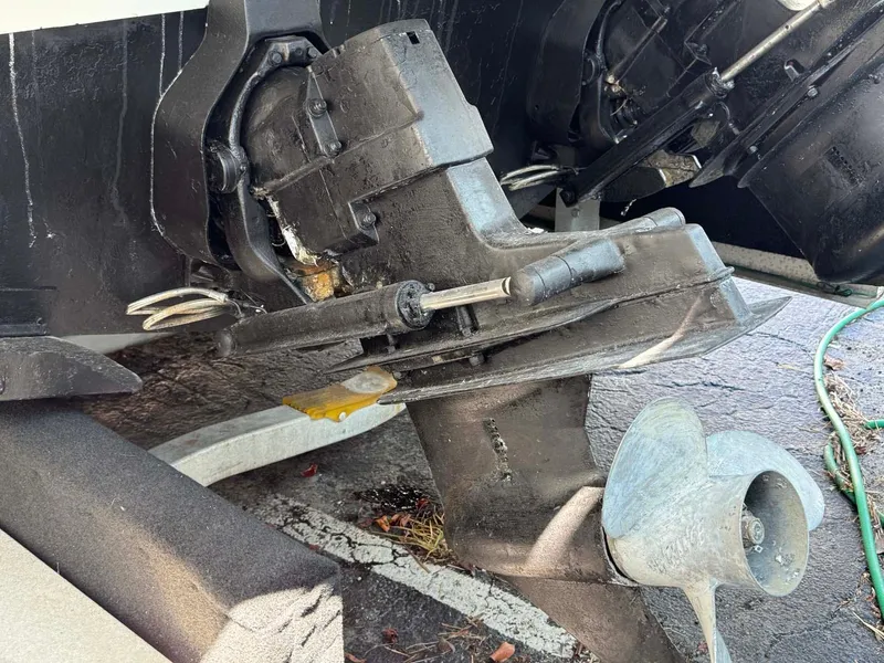 Slide: The Image of Close-up of 2002 Larson 310 Cabrio boat's propeller and stern drive. - 6