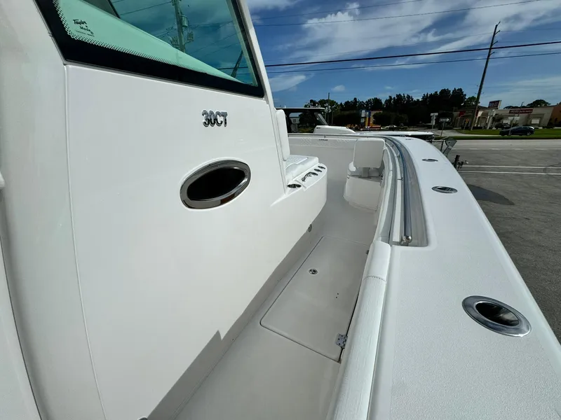 Slide: The Image of 2025 Caymas 30 CT boat deck with sleek design and modern features. - 16
