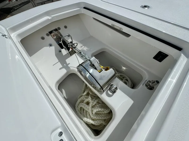 Slide: The Image of Anchor compartment of 2025 Caymas 30 CT boat with rope storage. - 22