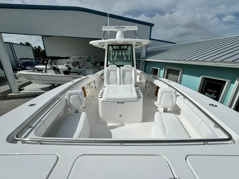 Slide: The Image of 2025 Caymas 30 CT boat with spacious seating and modern design. - 23