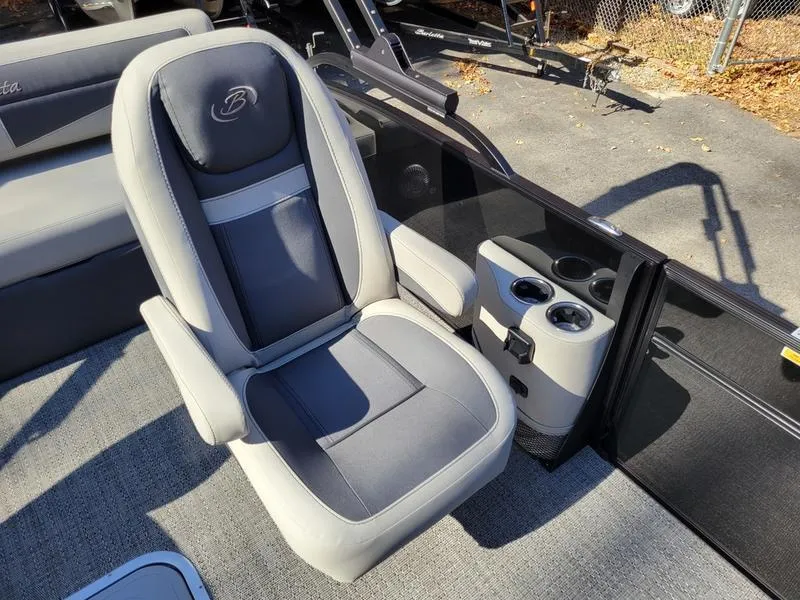 Slide: The Image of 2025 Barletta C22UC boat seat with cup holders, gray upholstery. - 18