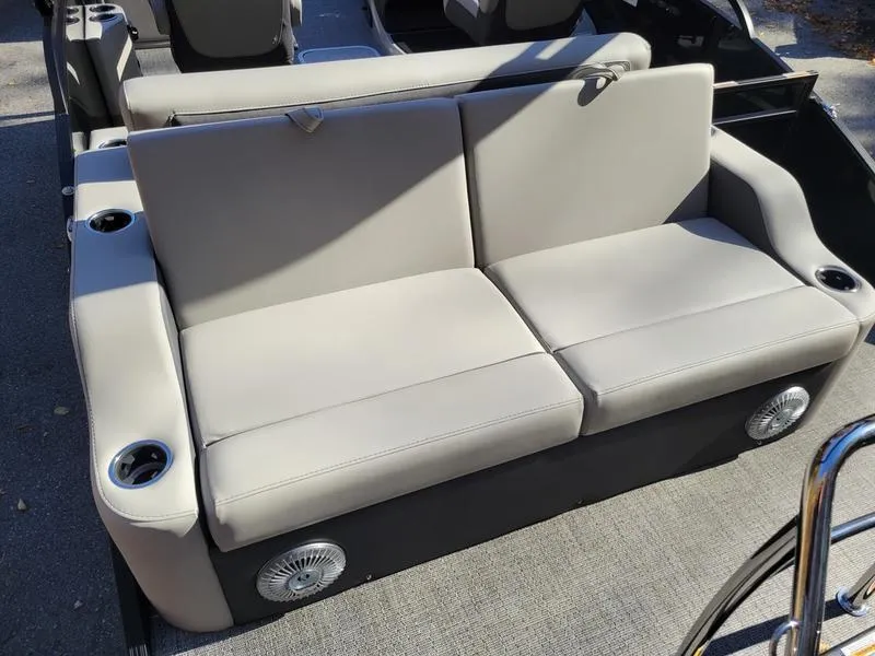 Slide: The Image of 2025 Barletta C22UC boat seating with cup holders and speakers. - 22