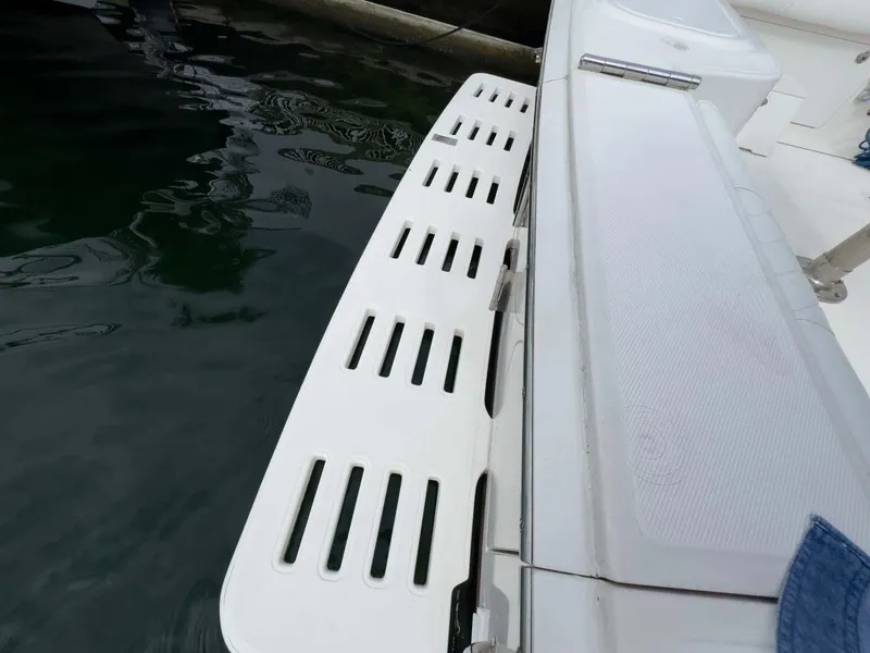 Slide: The Image of Cabo 35 Express 2007 boat swim platform with water view. - 19