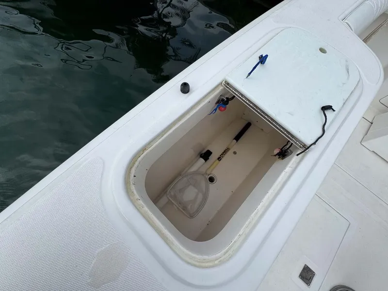 Slide: The Image of Open storage compartment on 2007 Cabo 35 Express boat deck. - 21