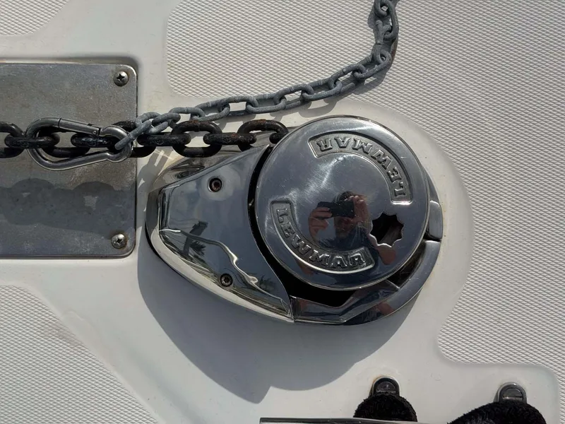 Slide: The Image of Close-up of a 2007 Cabo 35 Express boat's anchor windlass with chain. - 25