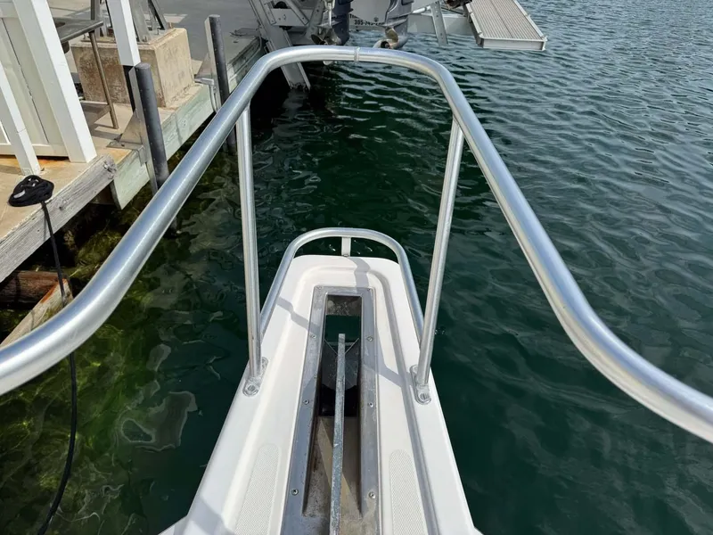 Slide: The Image of Bow view of 2007 Cabo 35 Express boat at dock. - 26