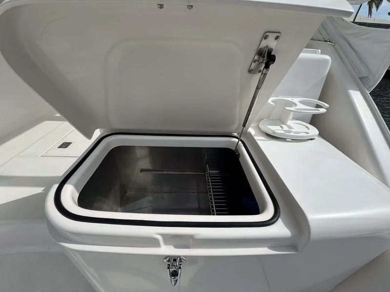 Slide: The Image of Open storage compartment on 2007 Cabo 35 Express boat deck. - 39