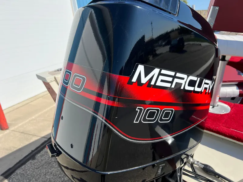 Slide: The Image of Mercury 100 outboard motor on 1997 Sylvan 1600 Pro Select boat. - 11