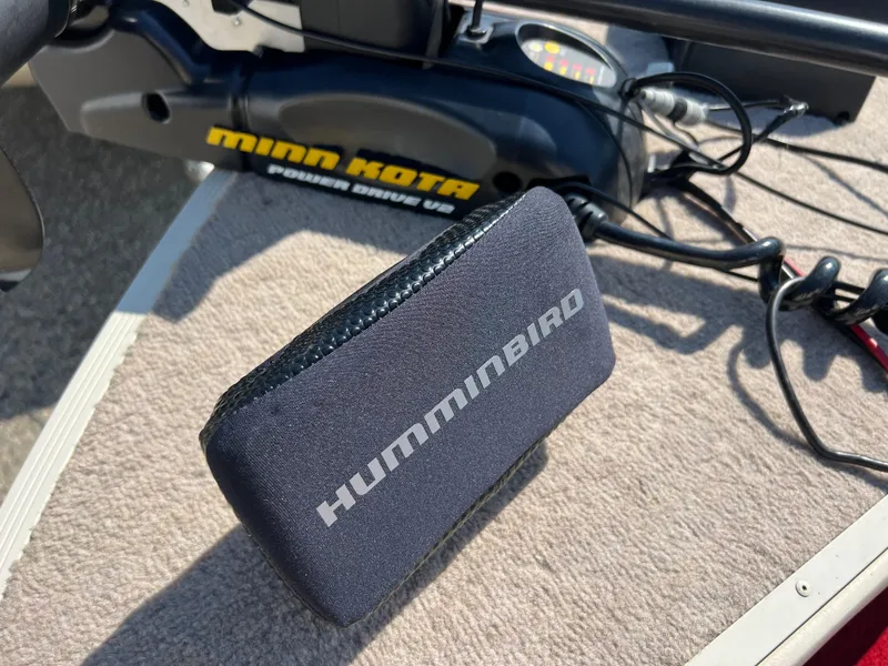 Slide: The Image of Humminbird device on 1997 Sylvan 1600 Pro Select boat with Minn Kota motor. - 14