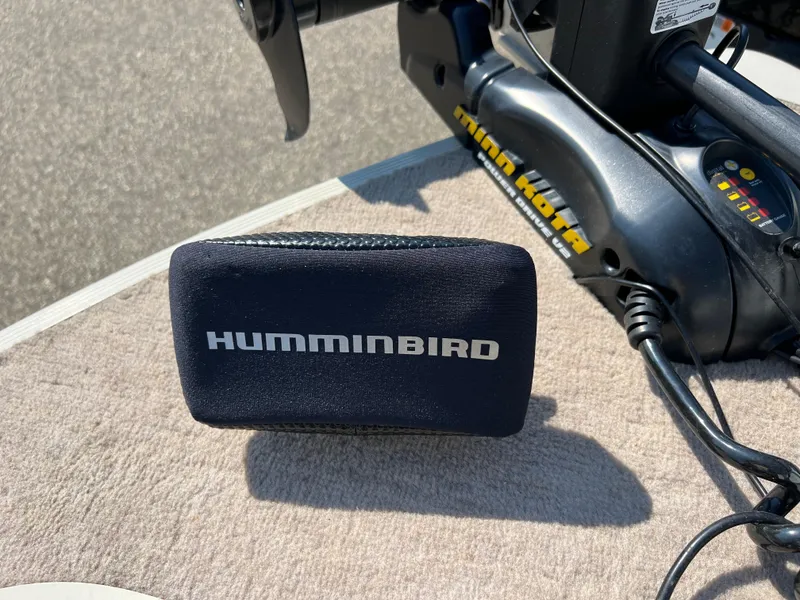 Slide: The Image of Humminbird device on 1997 Sylvan 1600 Pro Select boat with Minn Kota motor. - 26