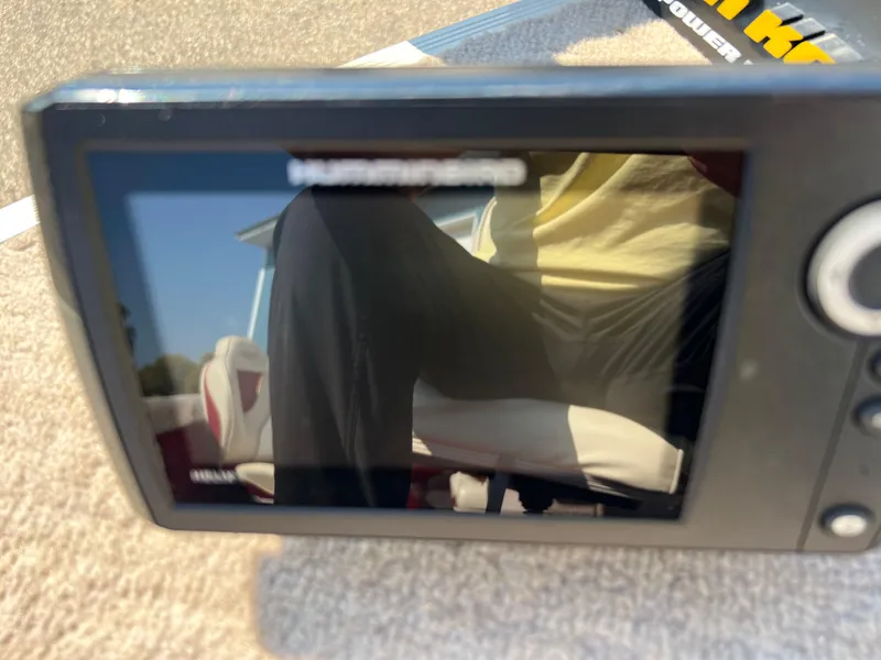Slide: The Image of Close-up of a boat's electronic display on a 1997 Sylvan 1600 Pro Select. - 27