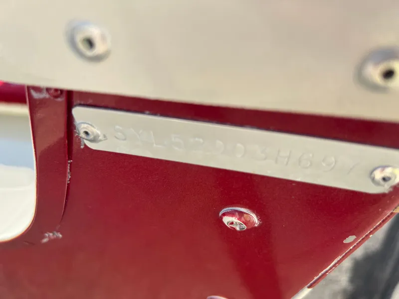 Slide: The Image of Close-up of 1997 Sylvan 1600 Pro Select boat serial number plate. - 36