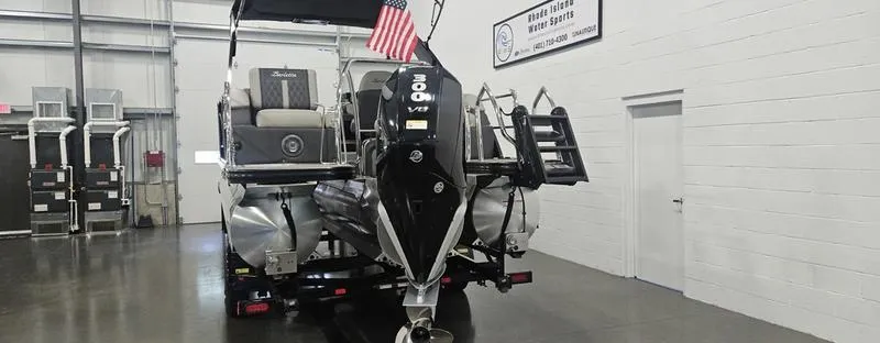 Slide: The Image of 2025 Barletta L23MA pontoon boat with powerful engine in showroom. - 13