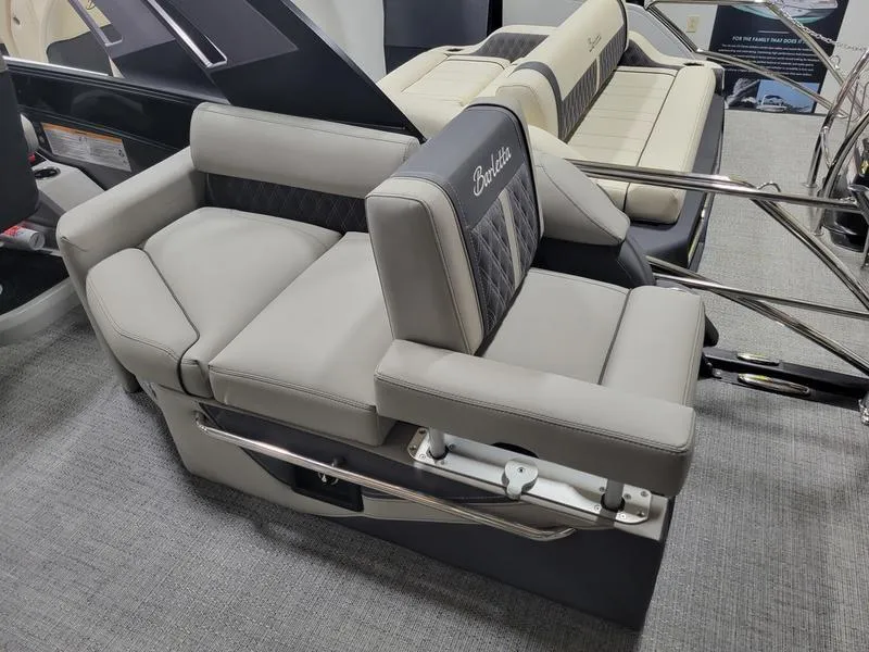 Slide: The Image of 2025 Barletta L23MA boat seating with luxurious gray upholstery and adjustable armrests. - 14