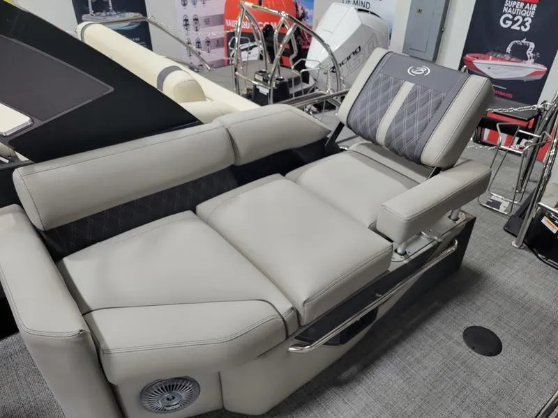 Slide: The Image of Luxurious seating on 2025 Barletta L23MA boat, featuring plush gray upholstery and adjustable backrest. - 16