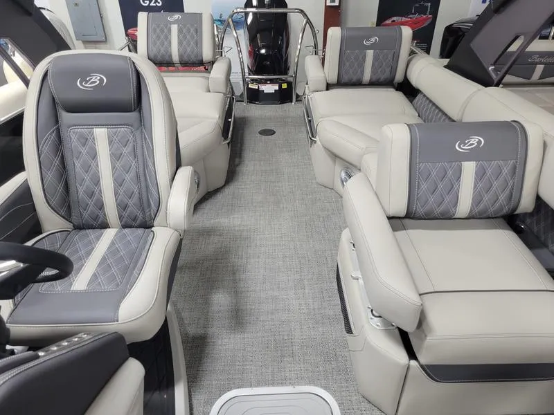 Slide: The Image of Luxurious interior of 2025 Barletta L23MA pontoon boat with plush seating and modern design. - 21