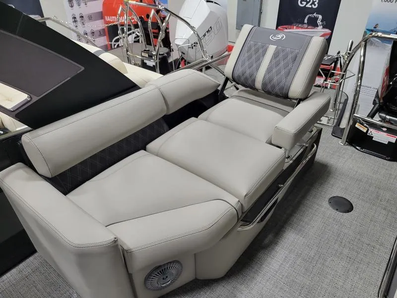 Slide: The Image of Luxurious seating on 2025 Barletta L23MA boat, featuring plush gray upholstery and modern design. - 7