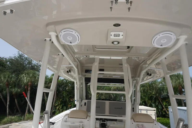 Slide: The Image of 2017 Everglades 355 CCX boat interior with speakers and seating. - 18