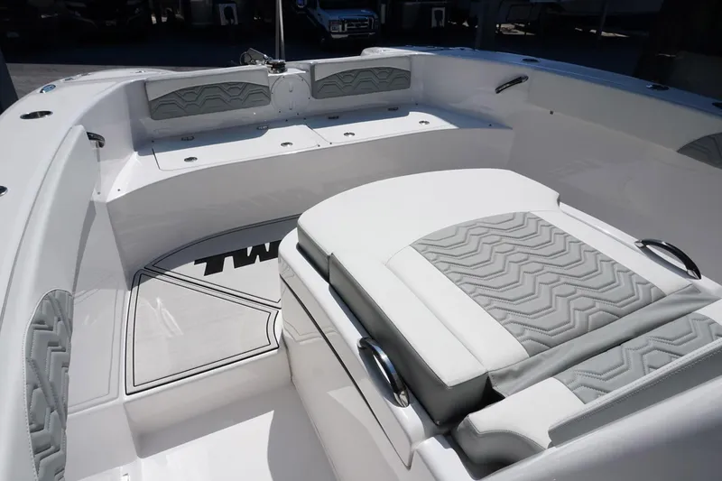 Slide: The Image of 2023 Twin Vee 280 GFX CC boat interior with stylish seating and modern design. - 16