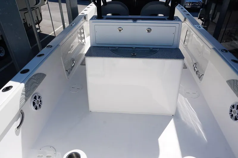 Slide: The Image of 2023 Twin Vee 280 GFX CC boat interior, featuring spacious deck and modern design. - 7